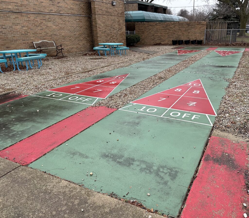 These rarely-used shuffleboard courts in Plymouth will be converted into a pickleball court.