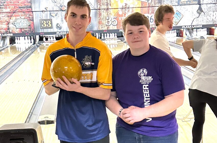 Andrew Neal and Michael Bell are pictured during the Special Olympics bowling tournament at Plaza Lanes.