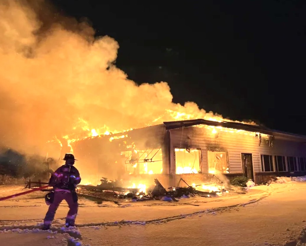 Flames engulf the Hickory Creek Golf Course and Country Club clubhouse on Jan. 25.