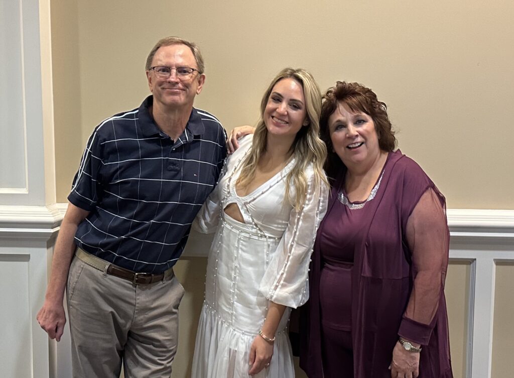 Peter1 - Social House News Peter Grantz is pictured with his-soon-to-be-married daughter and his wife.