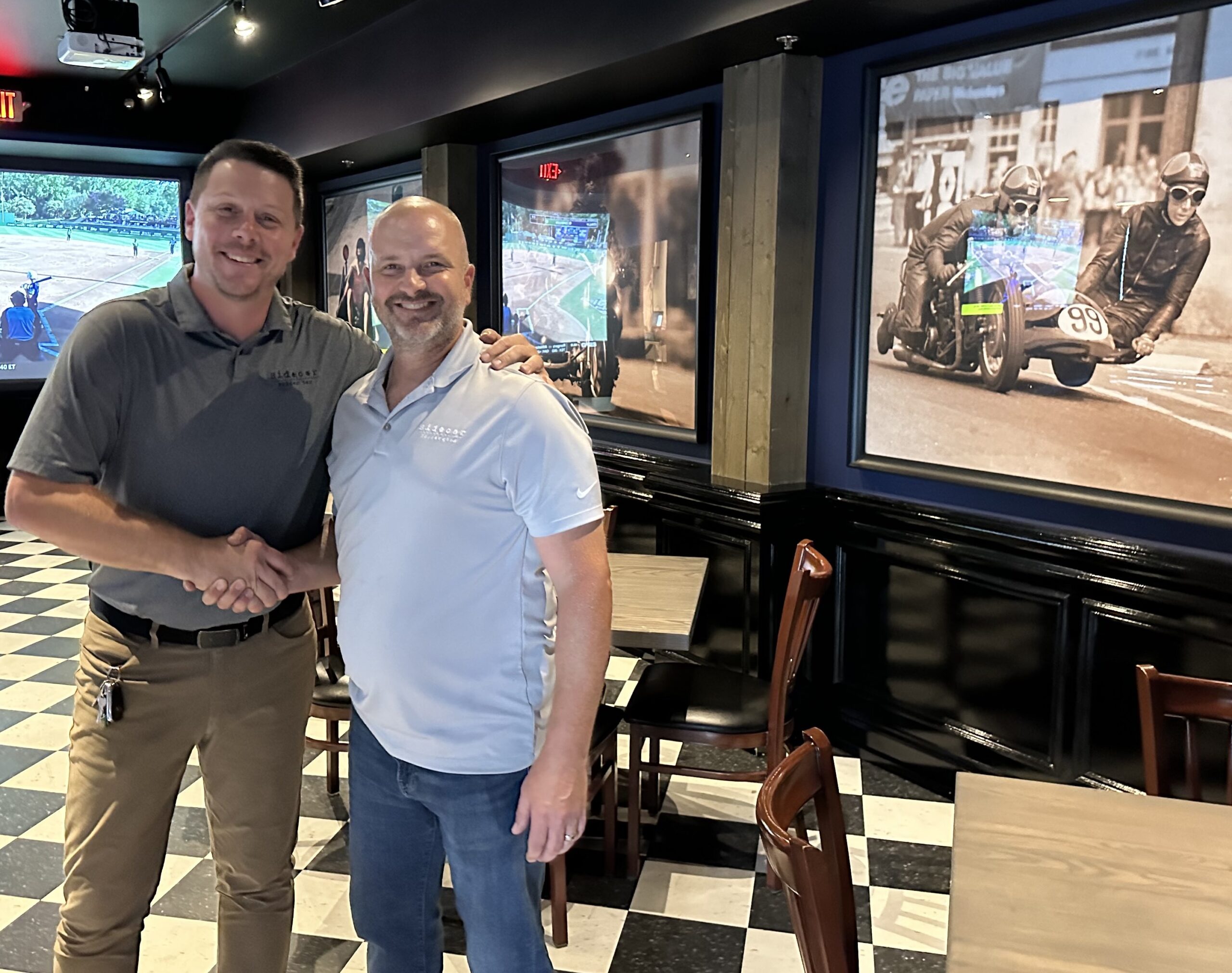 Sidecar4 - Social House News Stephen Simon and Scott Pelc are pictured in the Sidecar Slider Bar dining room hours after the business opened at 340 N Main Street in Plymouth.