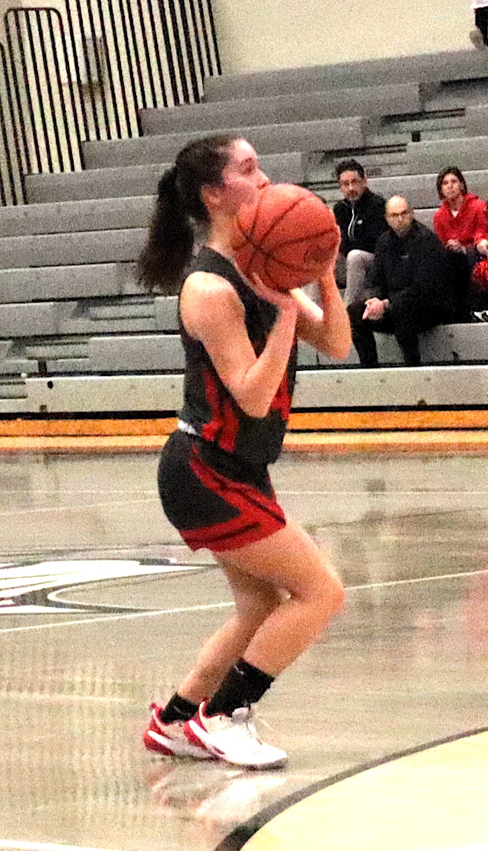 Elizabeth Persinger launches a three point shot