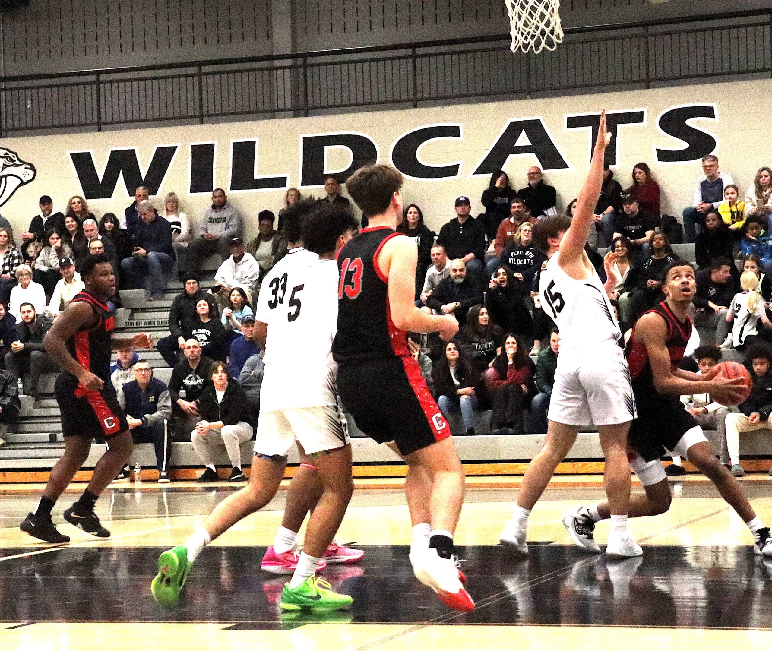 Bradley Eziuka looks for space against Plymouth defender Cam Short