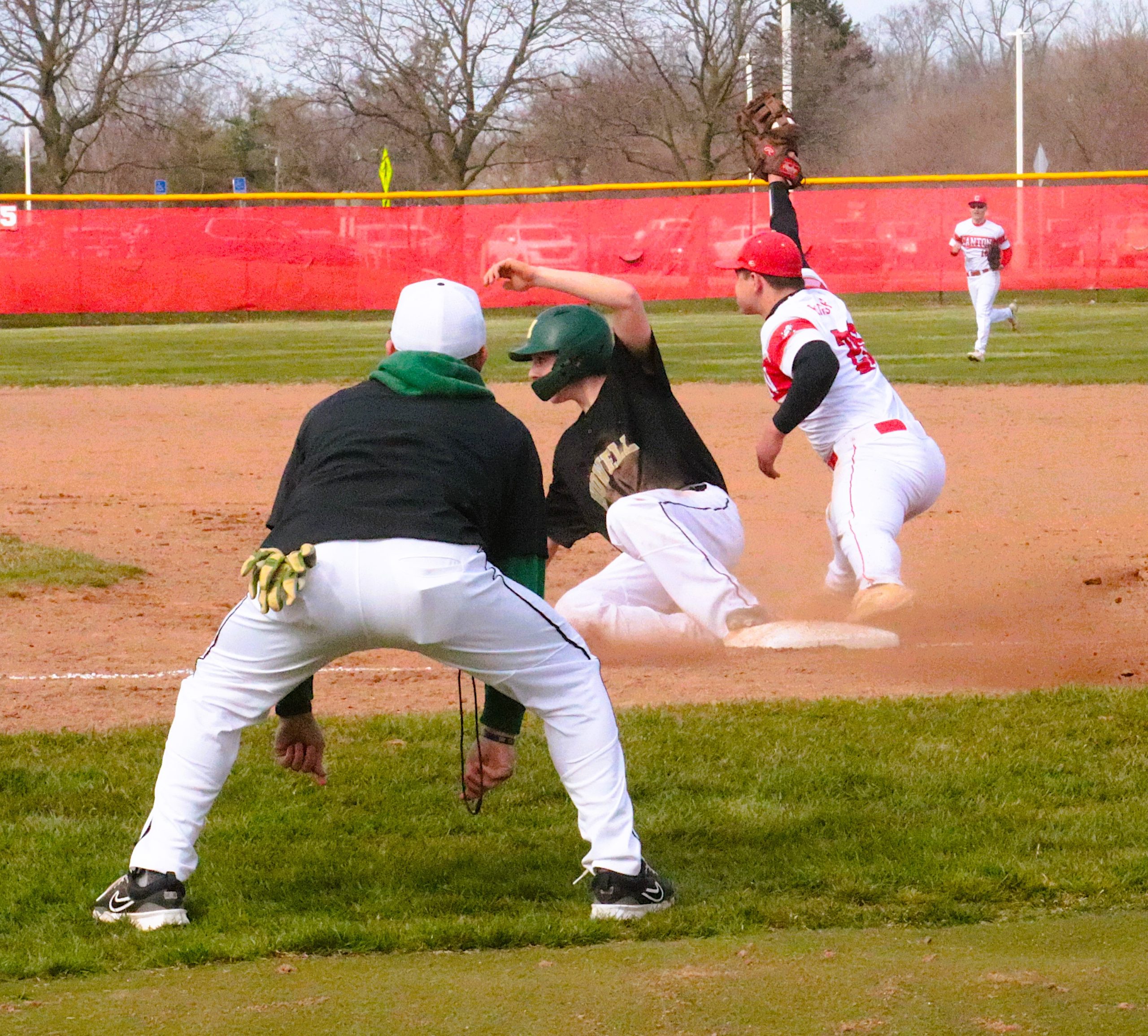CantonBase13 - Social House News Brodi English shows the umpire the ball after Canton completed a second inning double play