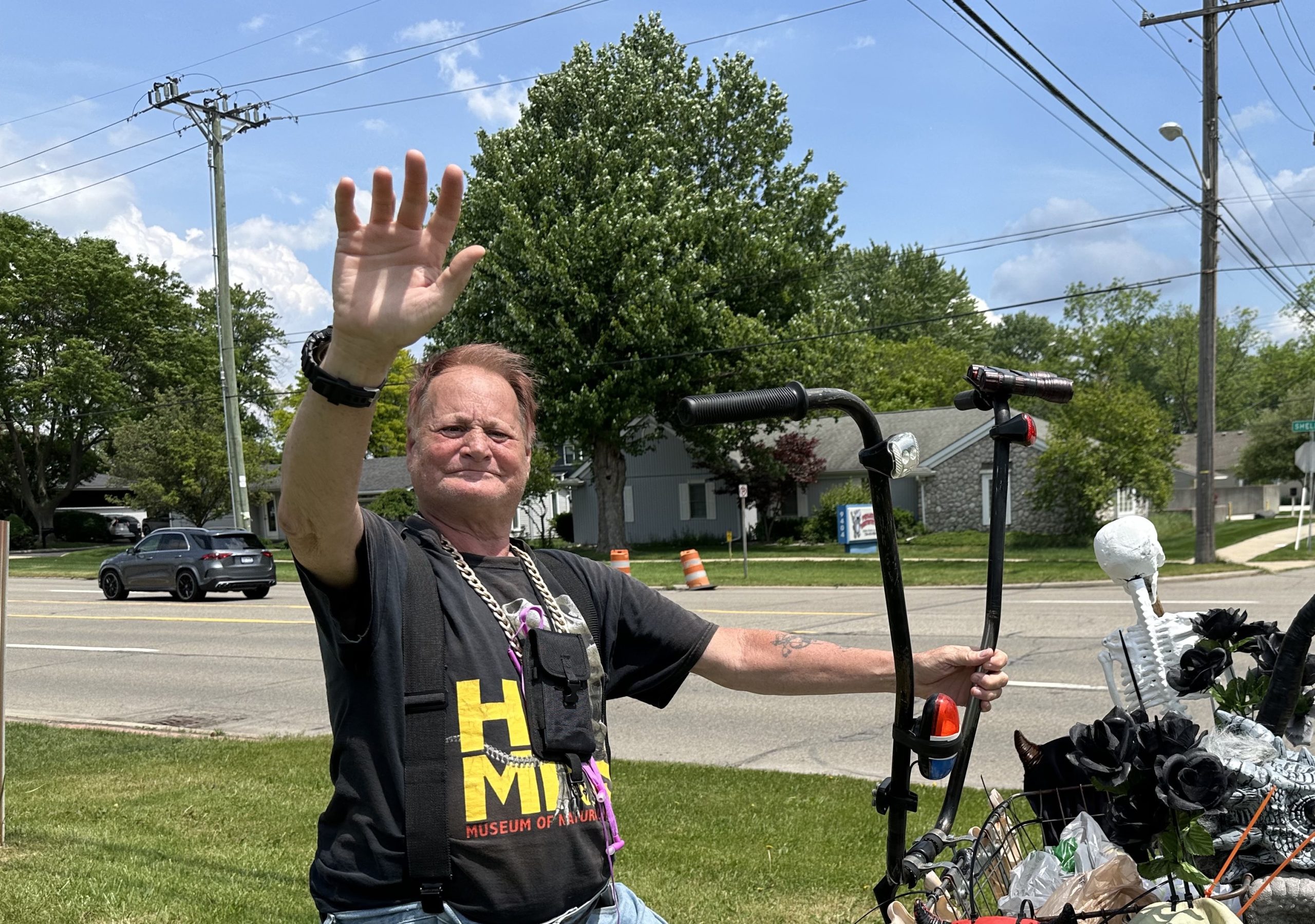 Dennis1 - Social House News Dennis Balcom frequently waves to people driving on Sheldon Road as he pedals along the sidewalk that runs parallel to the roadway