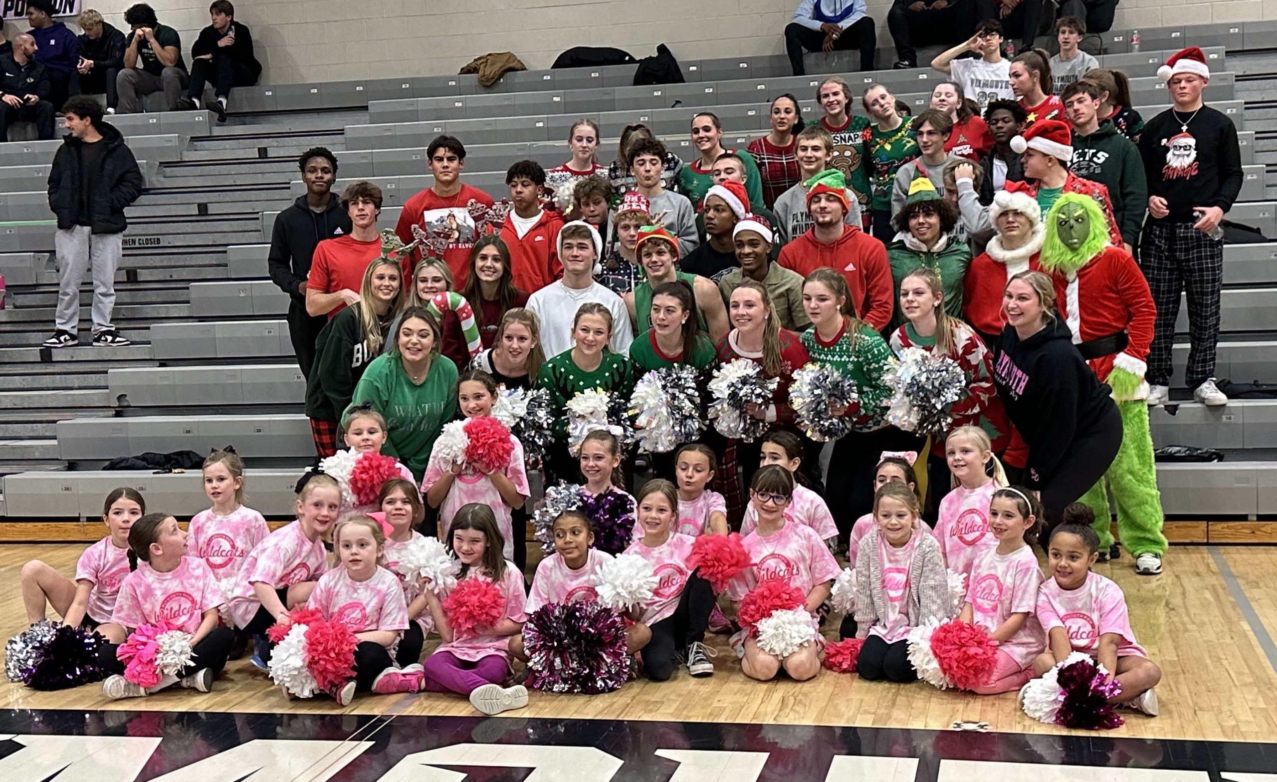 Pictured are members of the festive student cheering section and Plymouth pom squad members