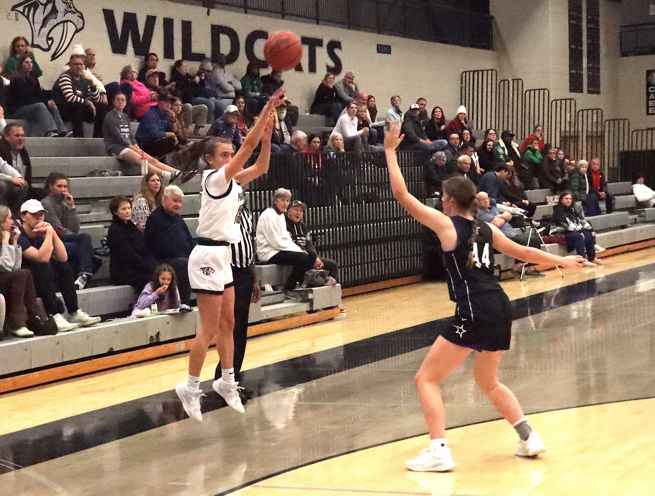 StCath1 - Social House News Mackenzie Dicken shows perfect form on this three point shot attempt