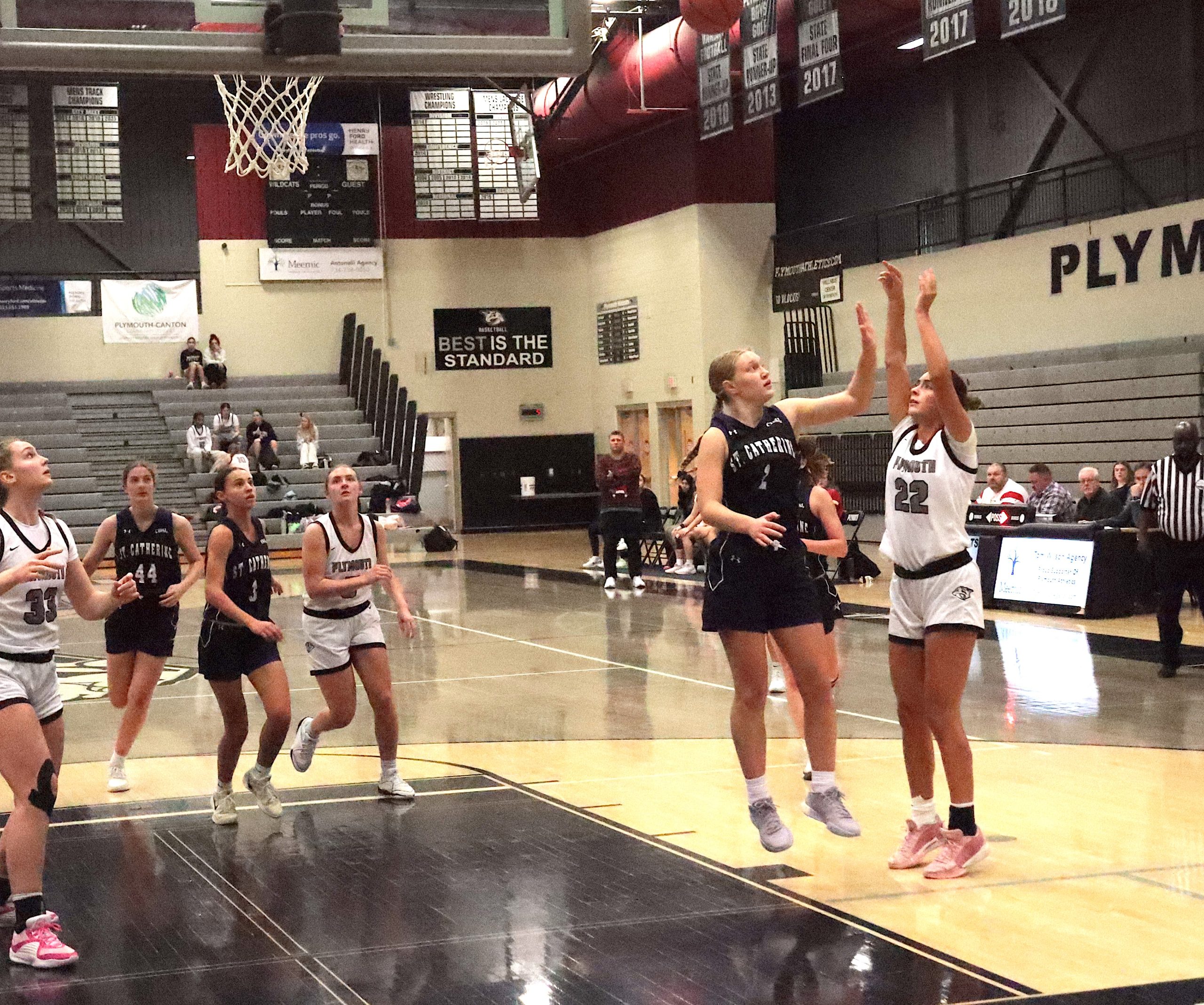 StCath4 - Social House News Annie Flavin fires up a baseline jumper