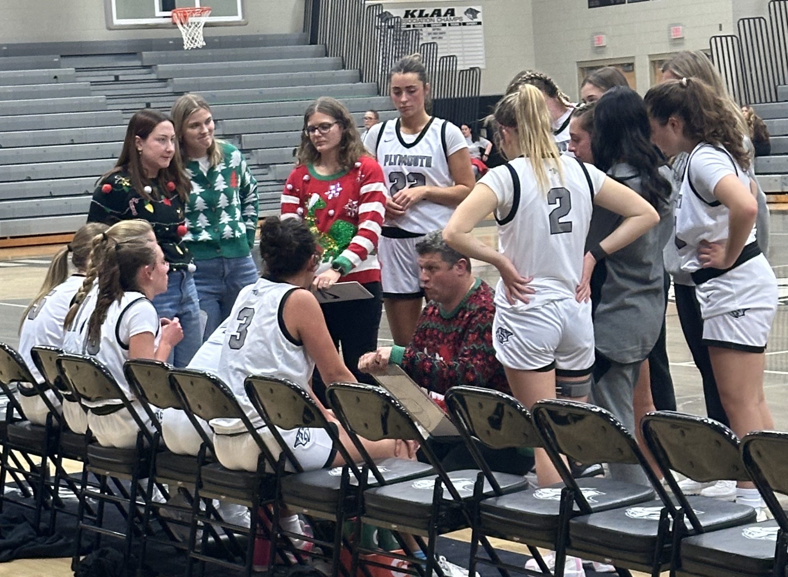 StCathBench - Social House News Plymouth players huddle around Head Coach Ryan Ballard during a second half timeout