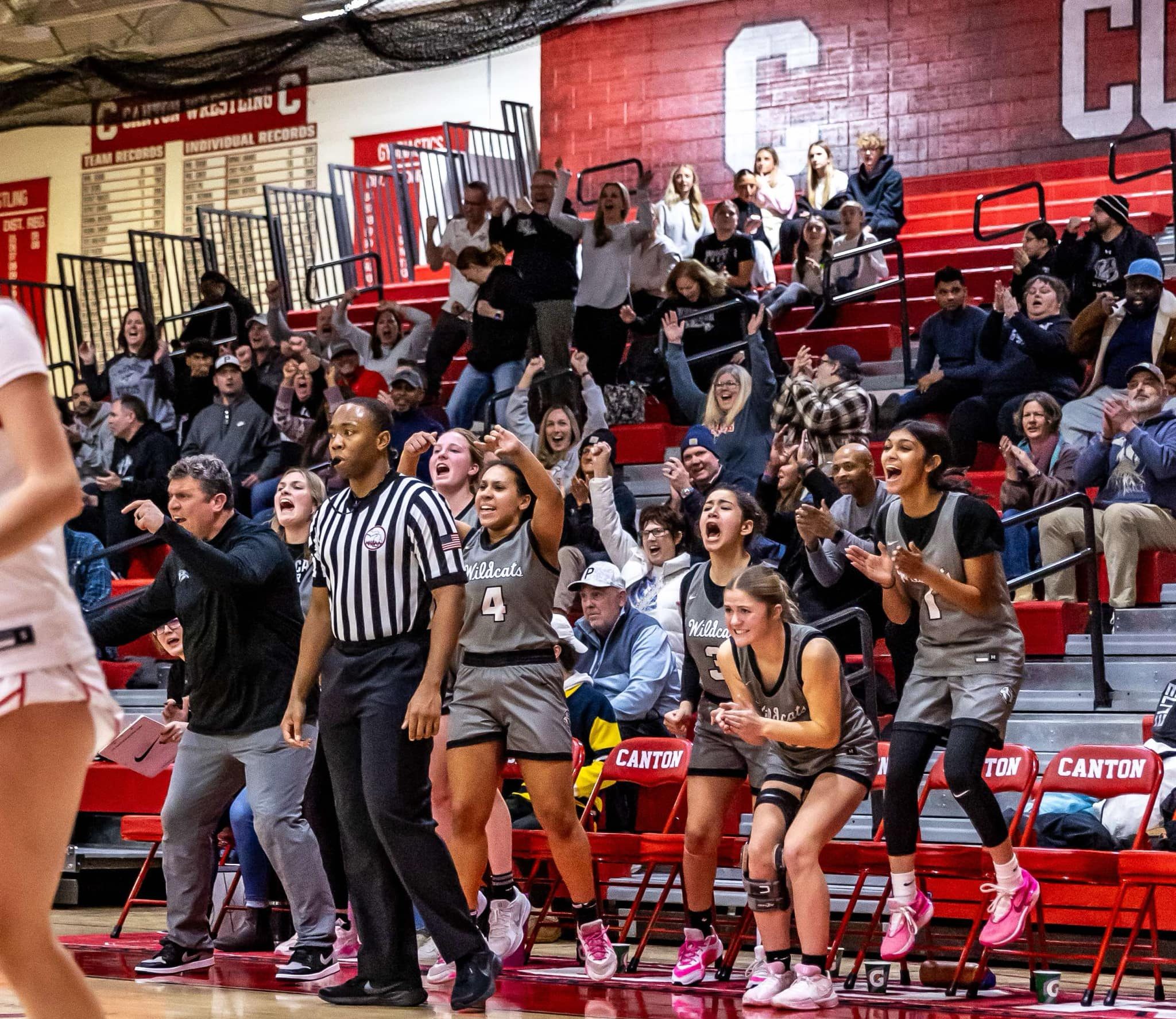 winningbucket2 - Social House News The Plymouth bench and the Wildcats fans rejoice after Lizzie Burnham banked home the winning basket.