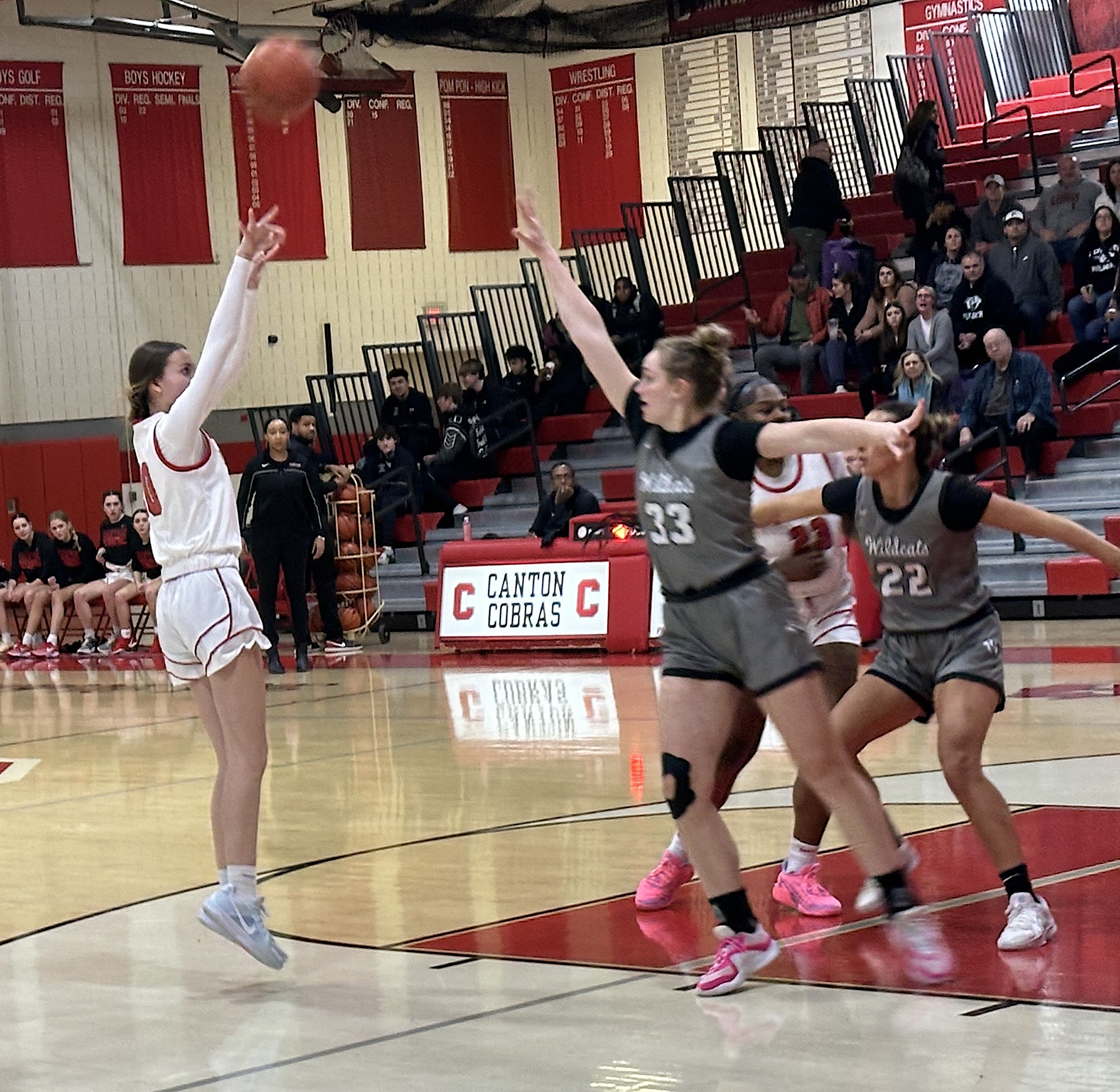 winningbucket3 - Social House News A Canton player releases a jump shot over Izzy Krause