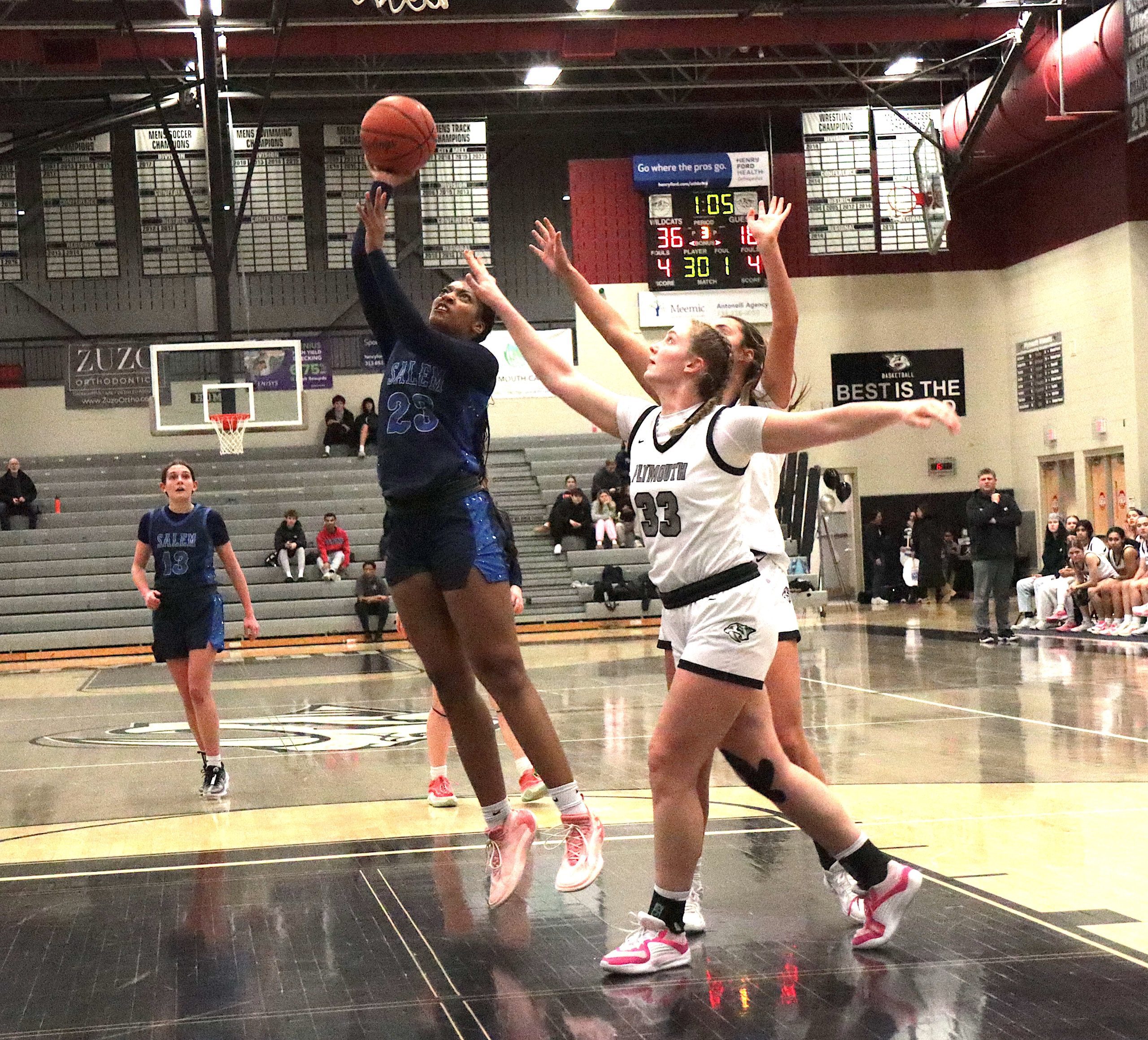 otclash7 - Social House News Salem senior Leilah Howard takes the ball strong to the basket