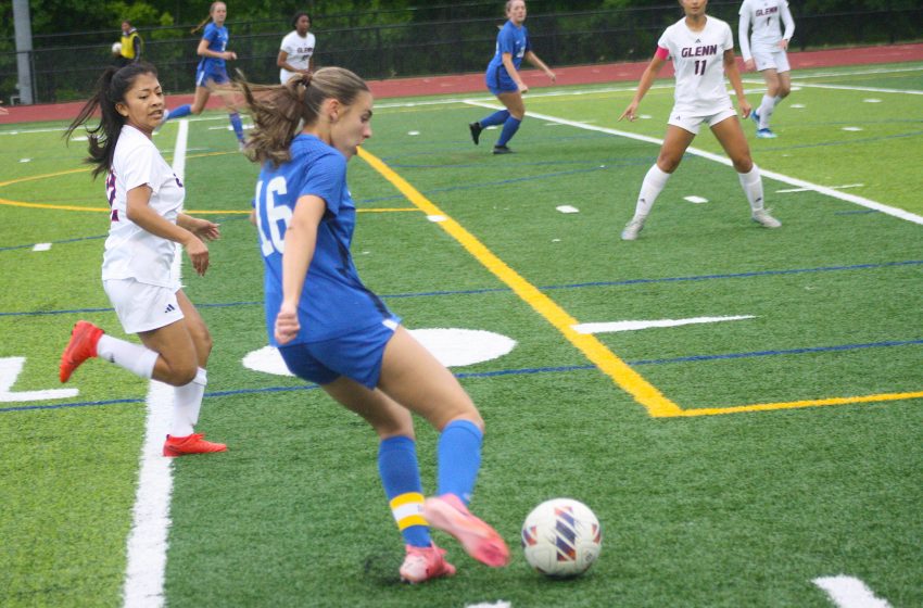 Salem senior Isabelle Prantera propels the ball toward the goal box during Wednesday's 7-0 victory over Westland John Glenn.