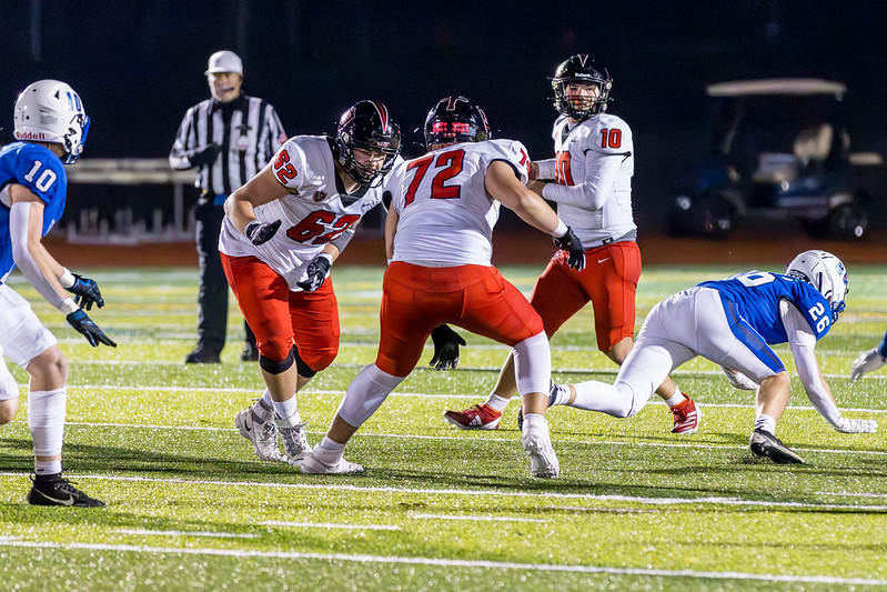 AliTalebAction1 - Social House News Ali Taleb looks for an open receiver during a game last fall PHOTO BY BOB PADGET