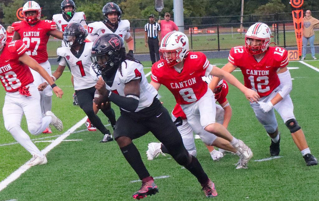 Churchill senior Dalvon Wideman gets the edge against Canton during Thursday night's season opener at the P-CEP's new North Field.