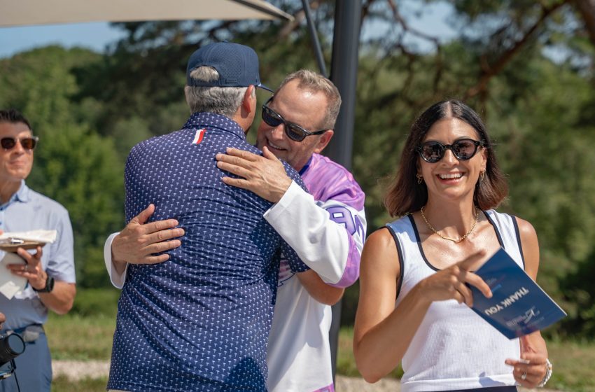 Comedian/cancer survivor Dave Coulier hugs an attendee at Sunday's Pain to Purpose event.