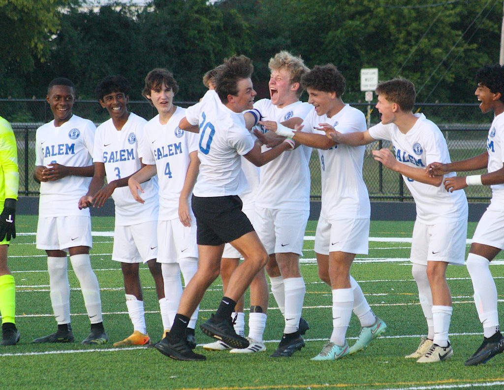 Salem senior soccer player Jack Madzia was greeted with exuberance during player introductions prior to the Rocks' Aug. 21 match against Plymouth.