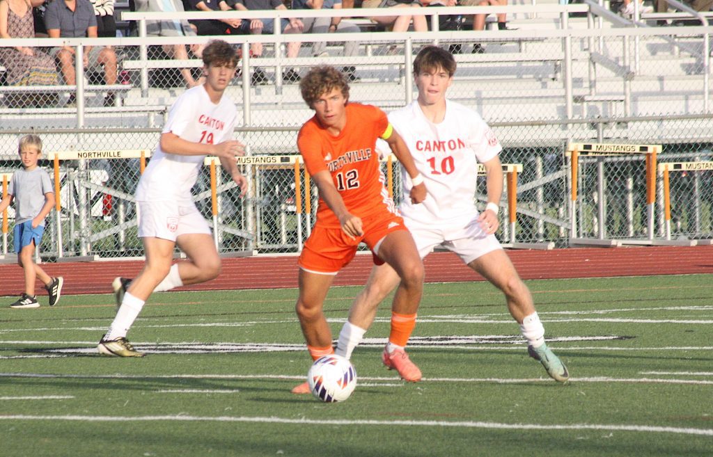 Northville senior Jack Eisman looks for an open teammate.