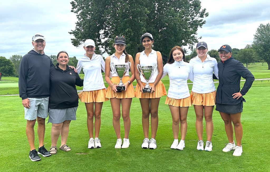 Northville won the 2nd Annual Dan Young Invitational Wednesday with a score of 295 -- 31 shots lower than runner-up Dexter. Pictured (from left) are Dan Young, Head Coach Kate Schultz, Cam Baker, Grace Bae, Naaz Gill, Serena Ku McKenzie Stevens and Assistant Coach Kelly Baker.