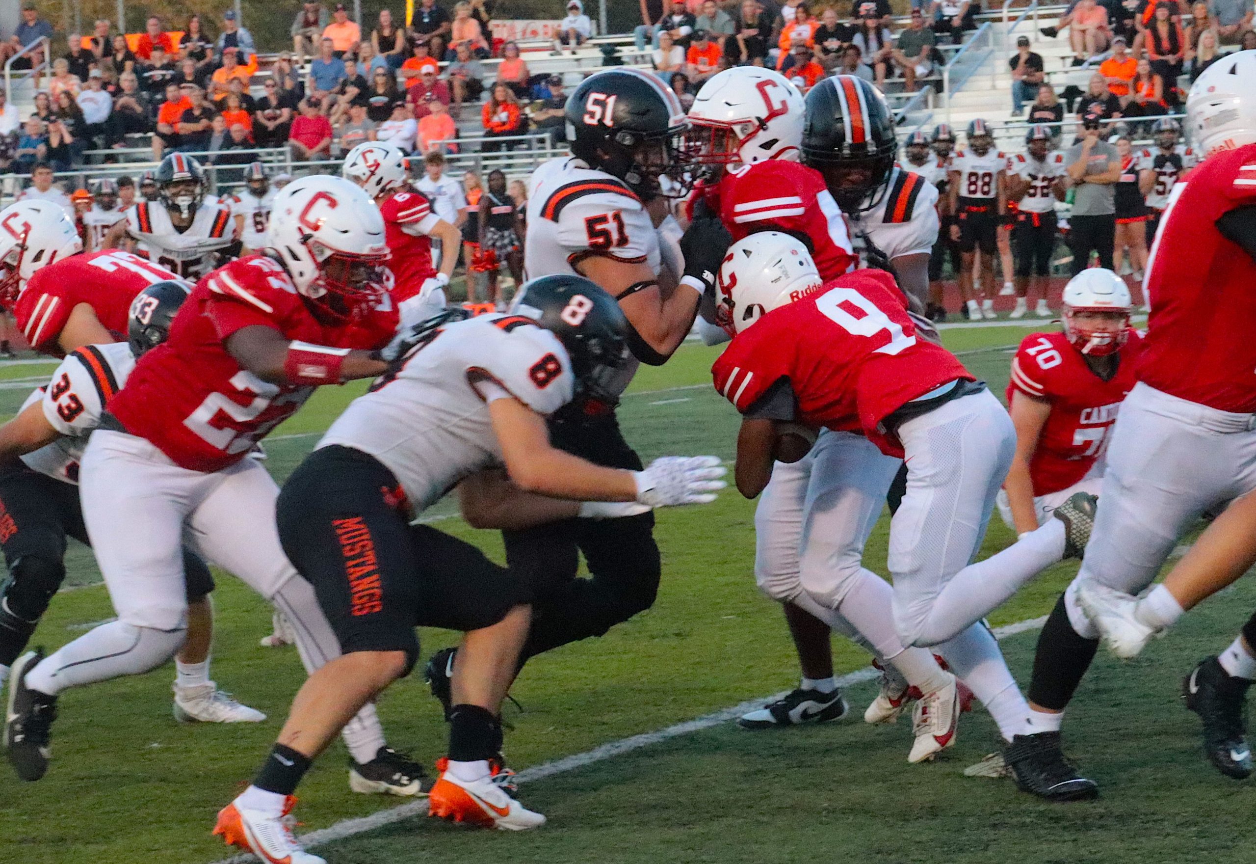Elliott Patten carries the ball against Northville in a 2024 game