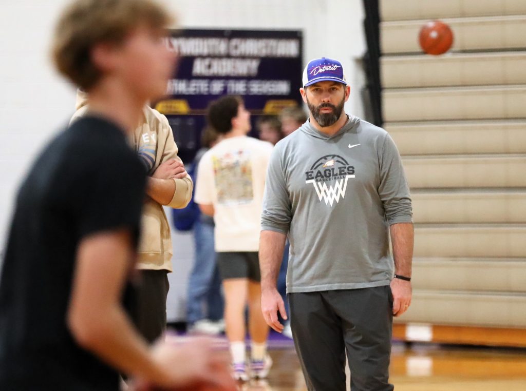 New PCA boys basketball coach John Bowman observes players during a recent workout. PHOTOS BY MICHAEL COSTELLO