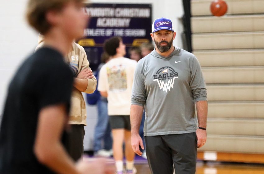New PCA boys basketball coach John Bowman observes players during a recent workout. PHOTOS BY MICHAEL COSTELLO