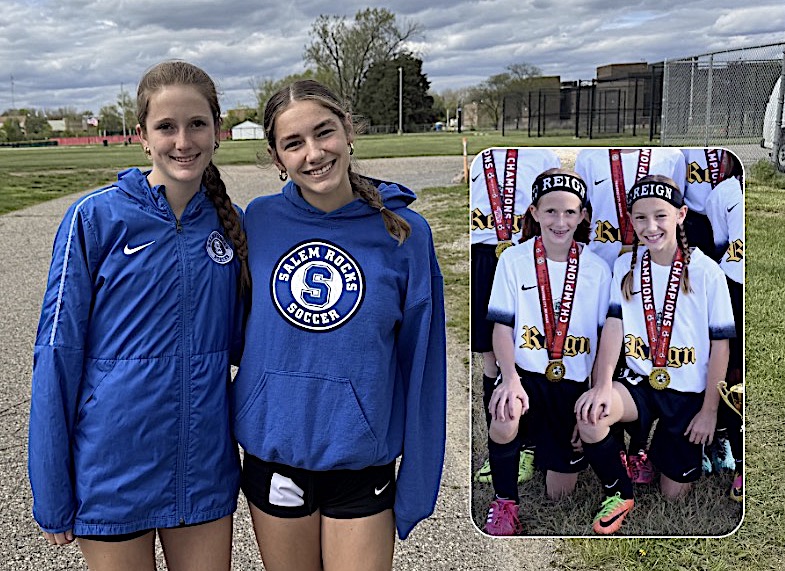 Two girls in blue zip jackets stand together on a gravel path outdoors, smiling; an inset shows their team photo with medals and white jerseys in a grassy field area.