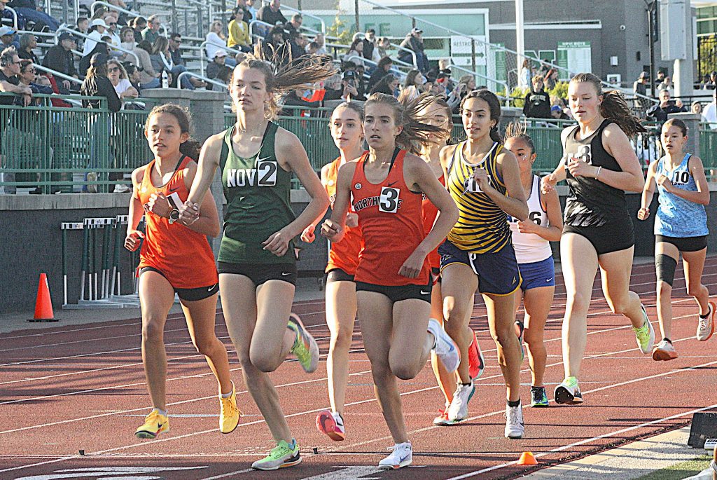 Northville freshman Alexandra Scappaticci (far left) won the 1,600-meter run at Friday's D1 regional at Novi.