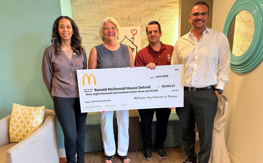 McDonald’s Owner/Operators Marissa Thrower-Fisher (left) and Yusef Alcodray (right) presented a check for $68,993.25 to the Ronald McDonald House Detroit during a check presentation event last week.